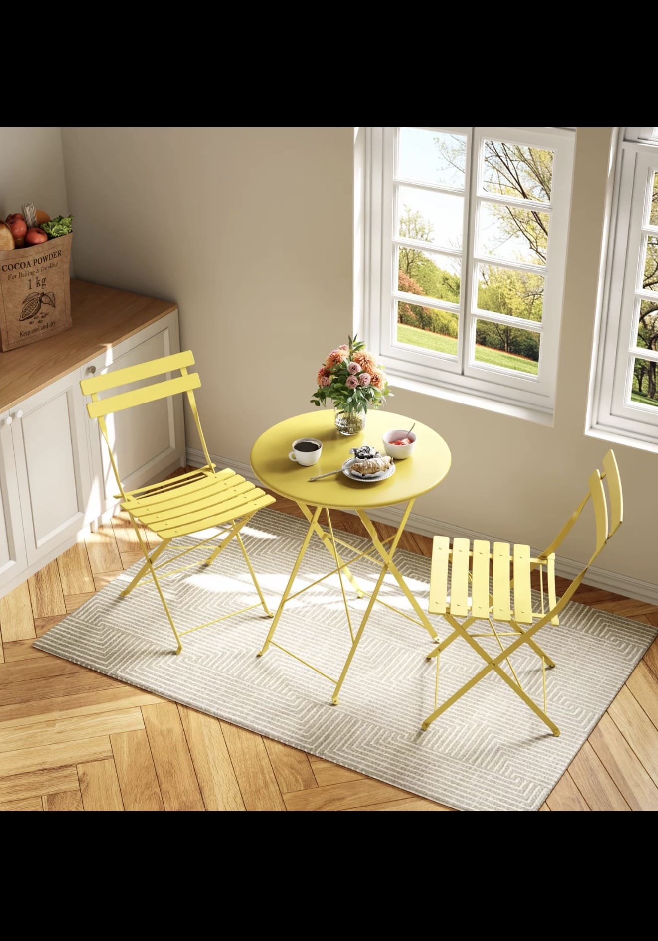 Sage green folding bistro set on balcony terrace