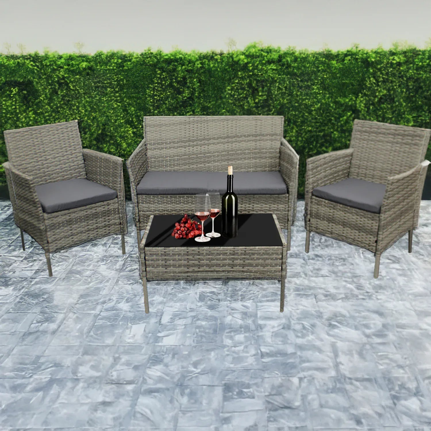 4-Piece Rattan Garden Furniture Set — Sofa, 2 Armchairs & Coffee Table with Cushions